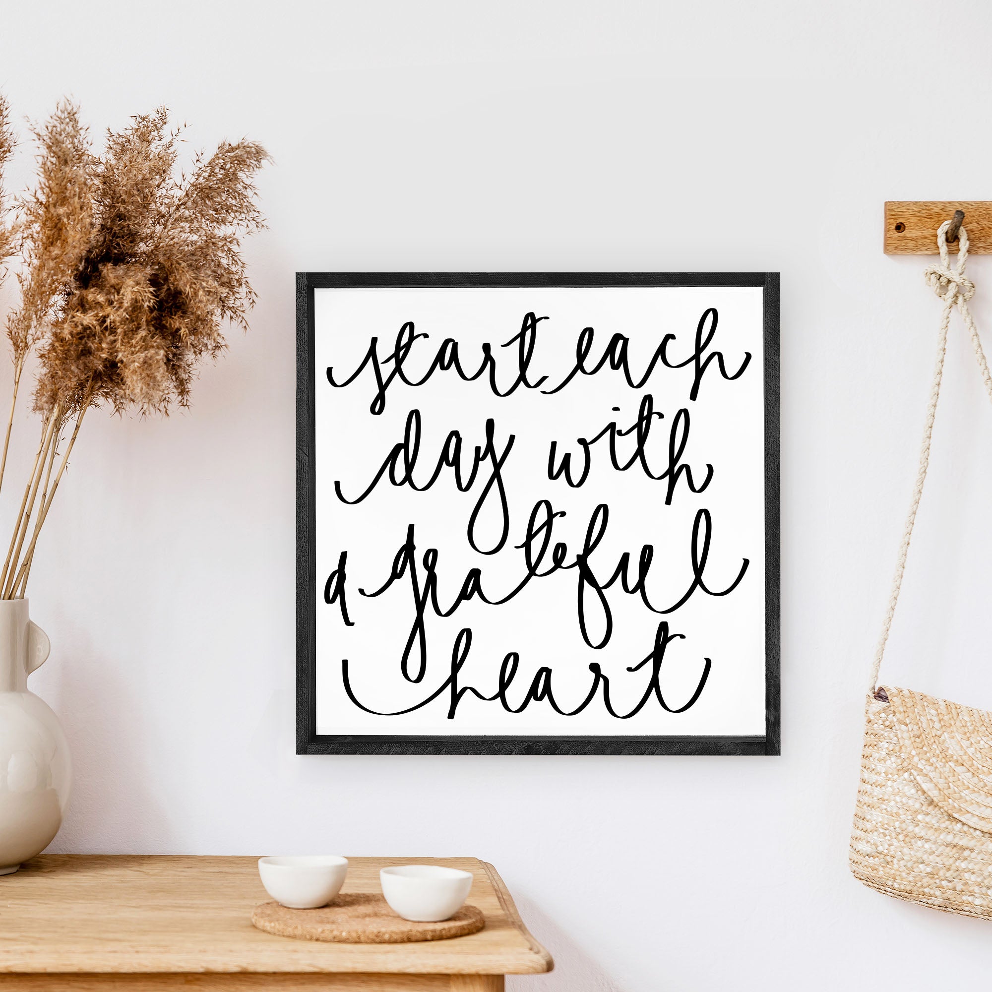 A beautifully crafted wood sign that reads 'Start Each Day With A Grateful Heart', featuring a pine wood frame and a white background.