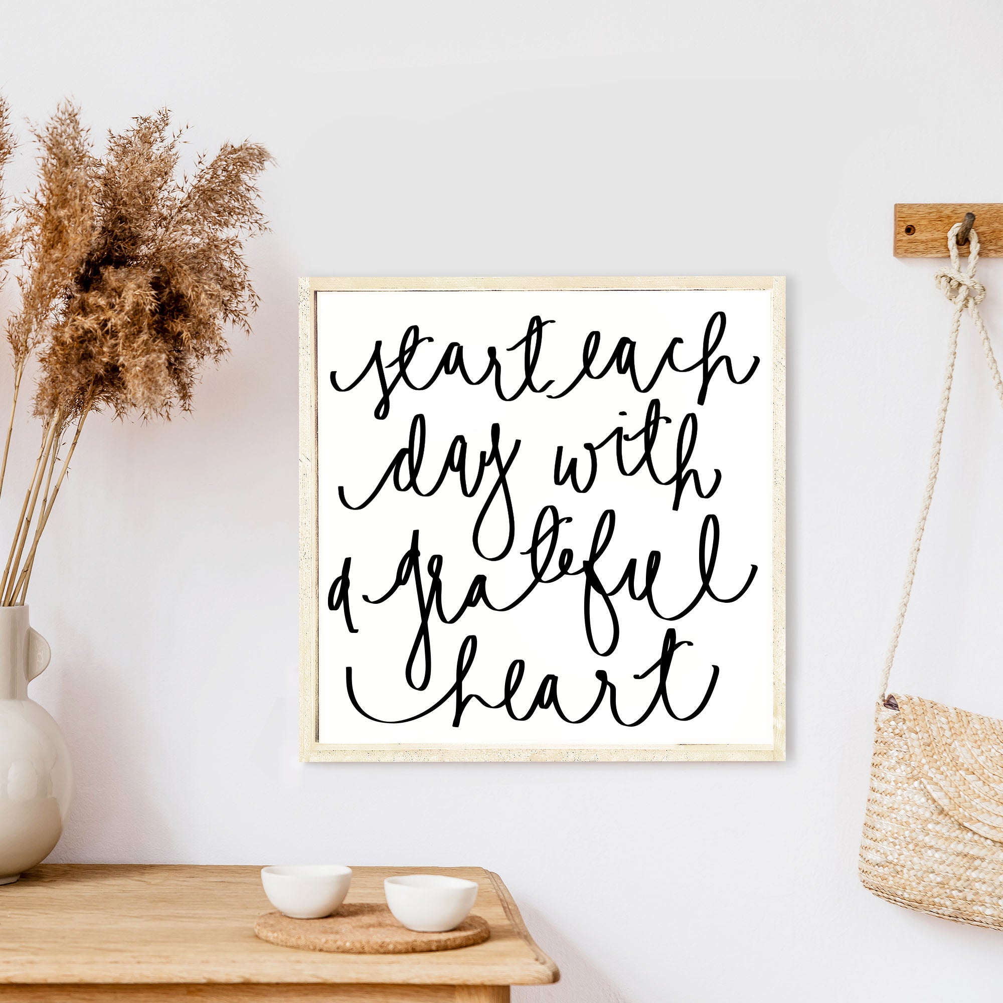 A beautifully crafted wood sign that reads 'Start Each Day With A Grateful Heart', featuring a pine wood frame and a white background.