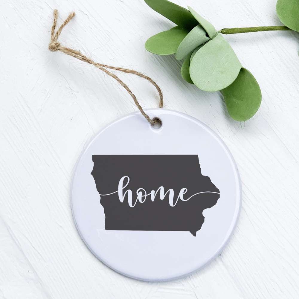 A beautifully crafted porcelain ornament featuring original designs, perfect for home decor or as a gift tag.