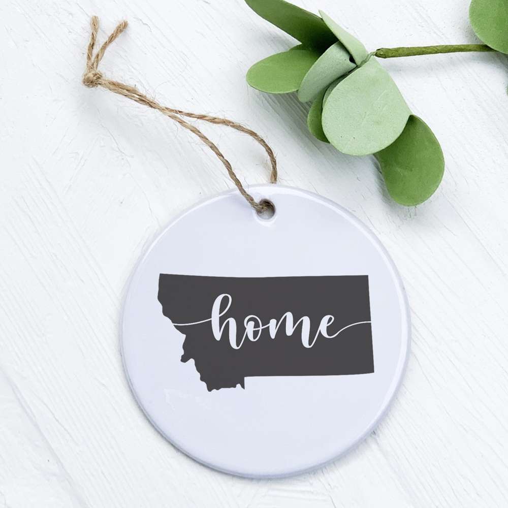 A beautifully crafted porcelain ornament featuring original designs, perfect for home decor or as a gift tag.