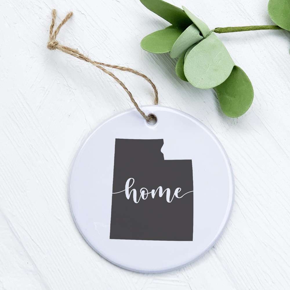 A beautifully crafted porcelain ornament featuring original designs, perfect for home decor or as a gift tag.