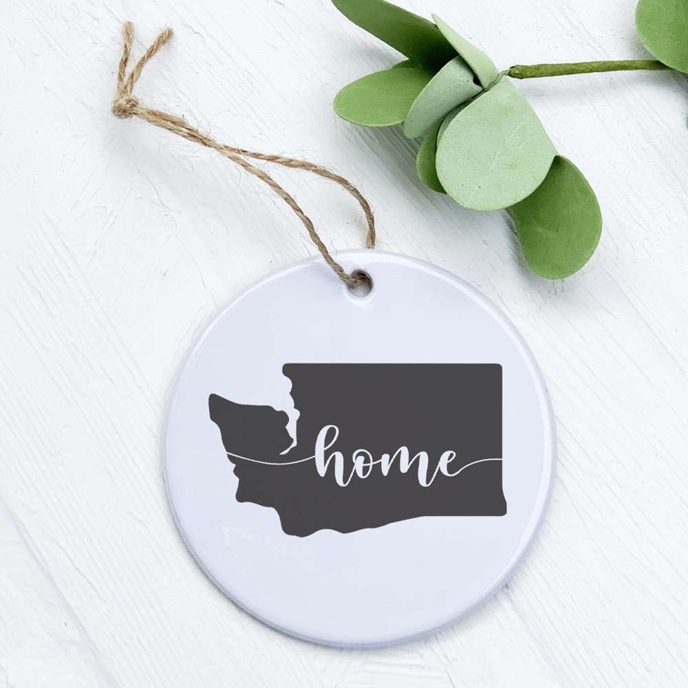 A beautifully crafted porcelain ornament featuring original designs, perfect for home decor or as a gift tag.