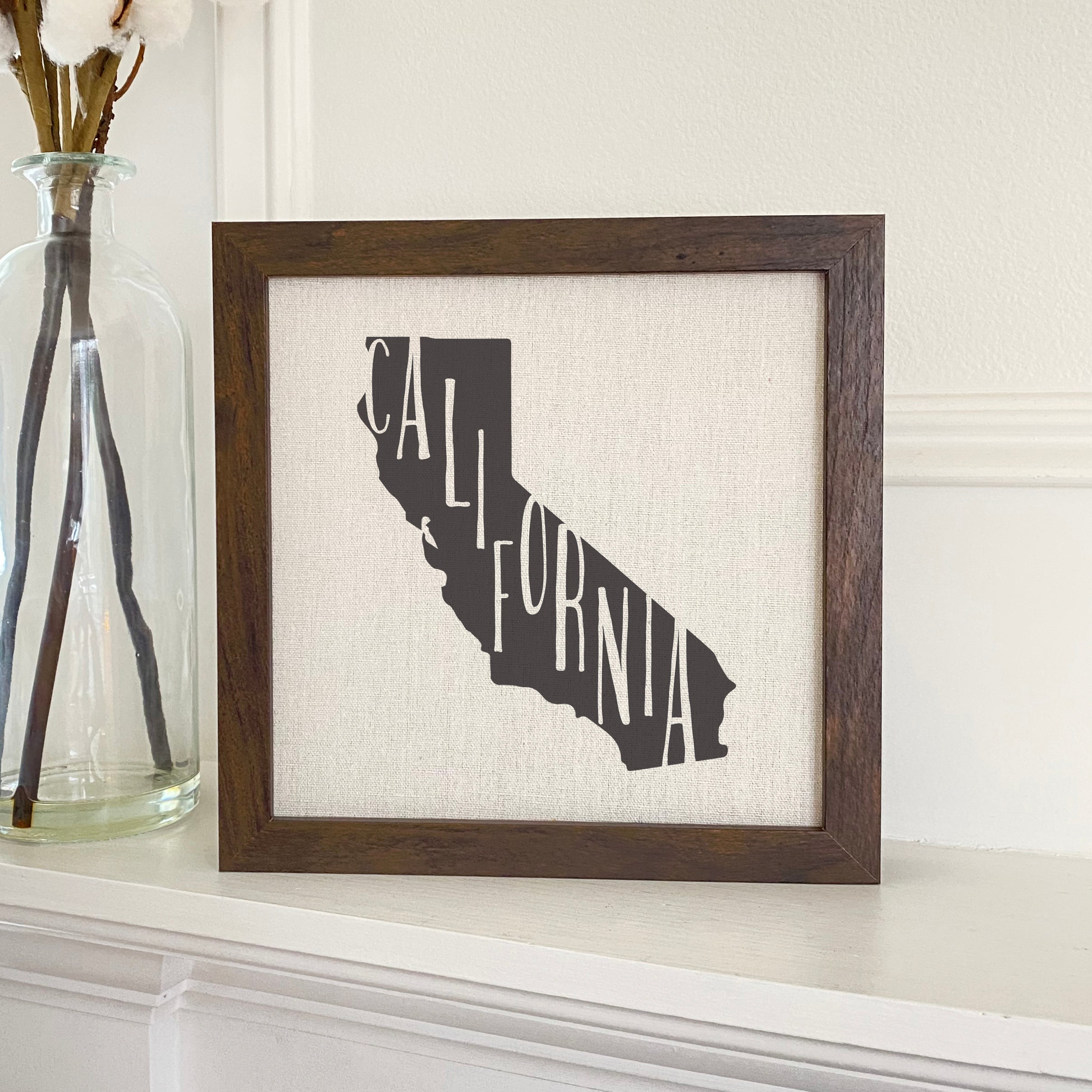 Stylish State Art Framed Sign with a wood frame, featuring eco-friendly printing on a linen-look background.