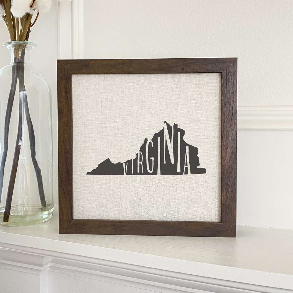 Stylish State Art Framed Sign with a wood frame, featuring eco-friendly printing on a linen-look background.