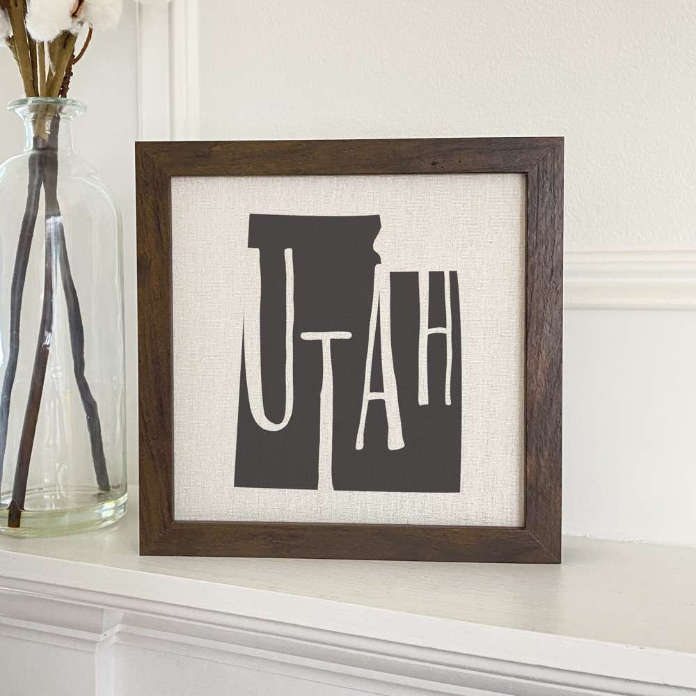 Stylish State Art Framed Sign with a wood frame, featuring eco-friendly printing on a linen-look background.