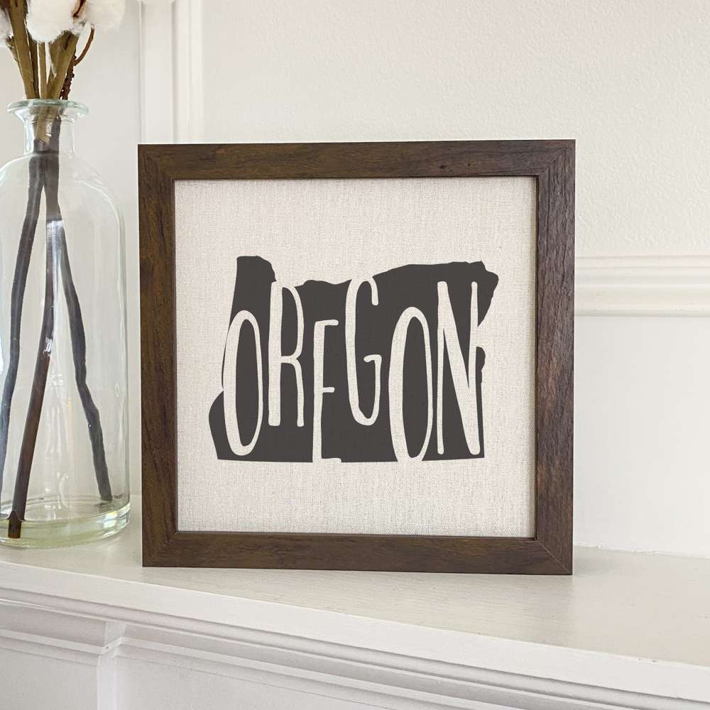 Stylish State Art Framed Sign with a wood frame, featuring eco-friendly printing on a linen-look background.