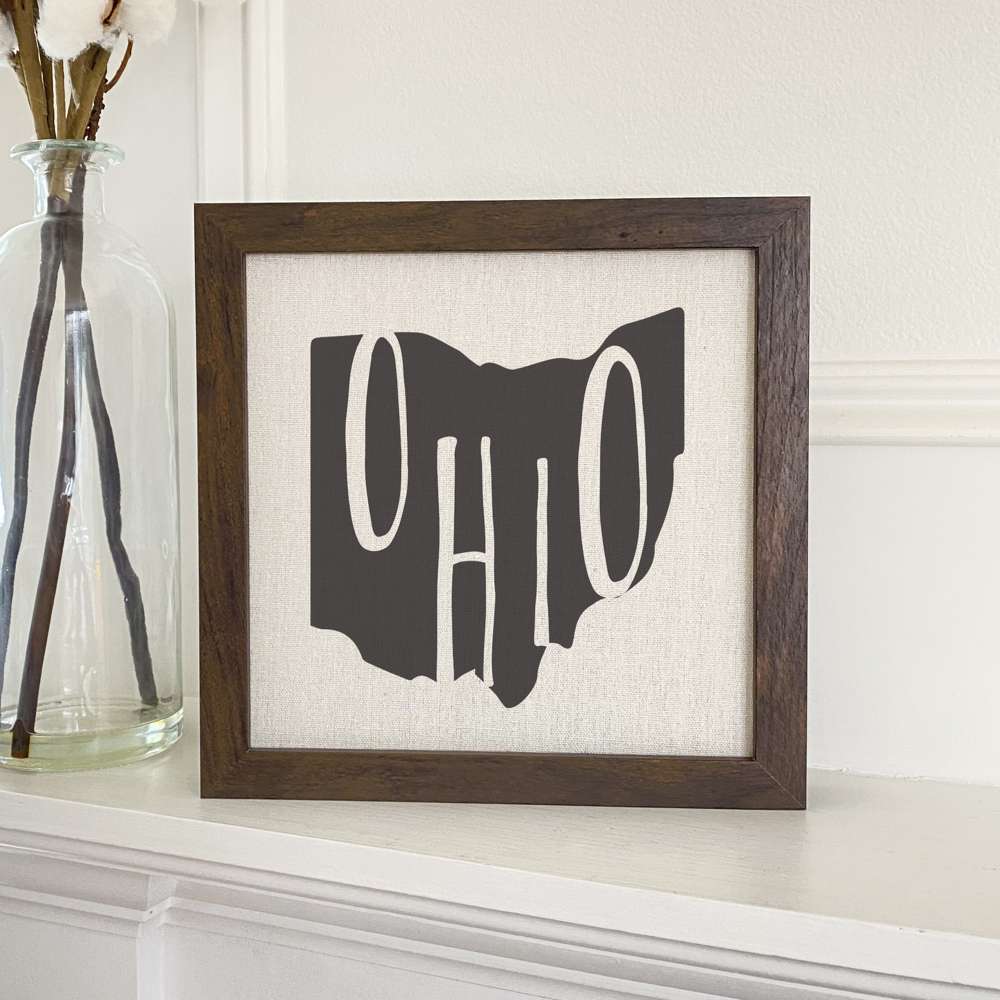 Stylish State Art Framed Sign with a wood frame, featuring eco-friendly printing on a linen-look background.