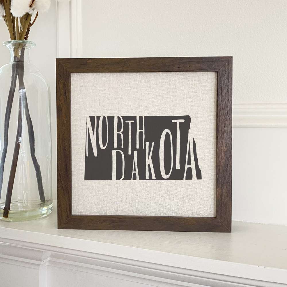 Stylish State Art Framed Sign with a wood frame, featuring eco-friendly printing on a linen-look background.