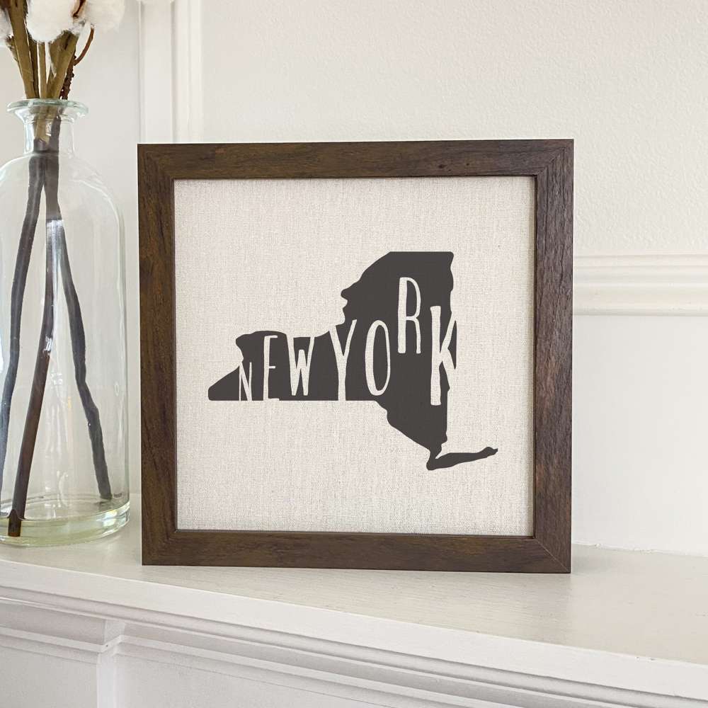 Stylish State Art Framed Sign with a wood frame, featuring eco-friendly printing on a linen-look background.