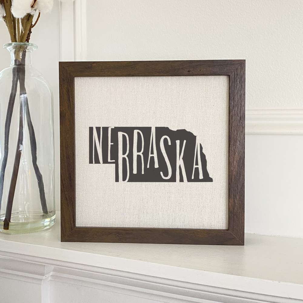 Stylish State Art Framed Sign with a wood frame, featuring eco-friendly printing on a linen-look background.