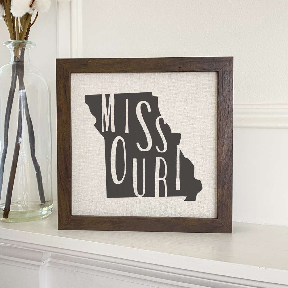 Stylish State Art Framed Sign with a wood frame, featuring eco-friendly printing on a linen-look background.