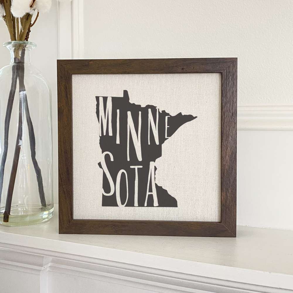 Stylish State Art Framed Sign with a wood frame, featuring eco-friendly printing on a linen-look background.