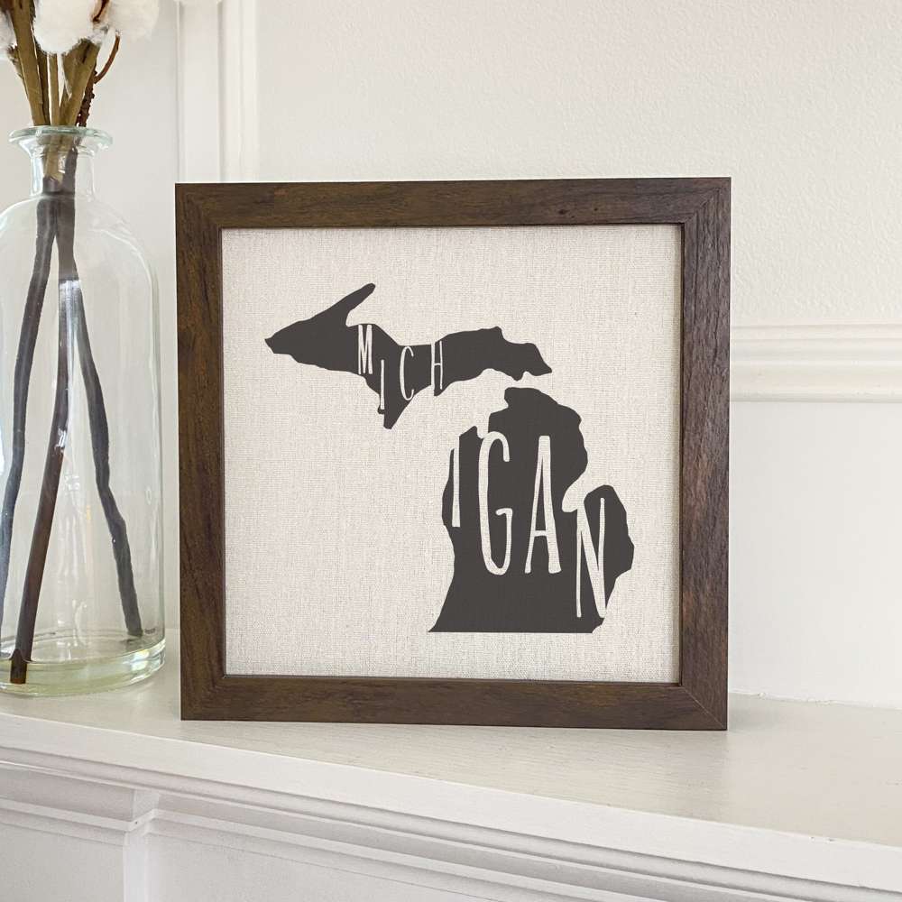 Stylish State Art Framed Sign with a wood frame, featuring eco-friendly printing on a linen-look background.