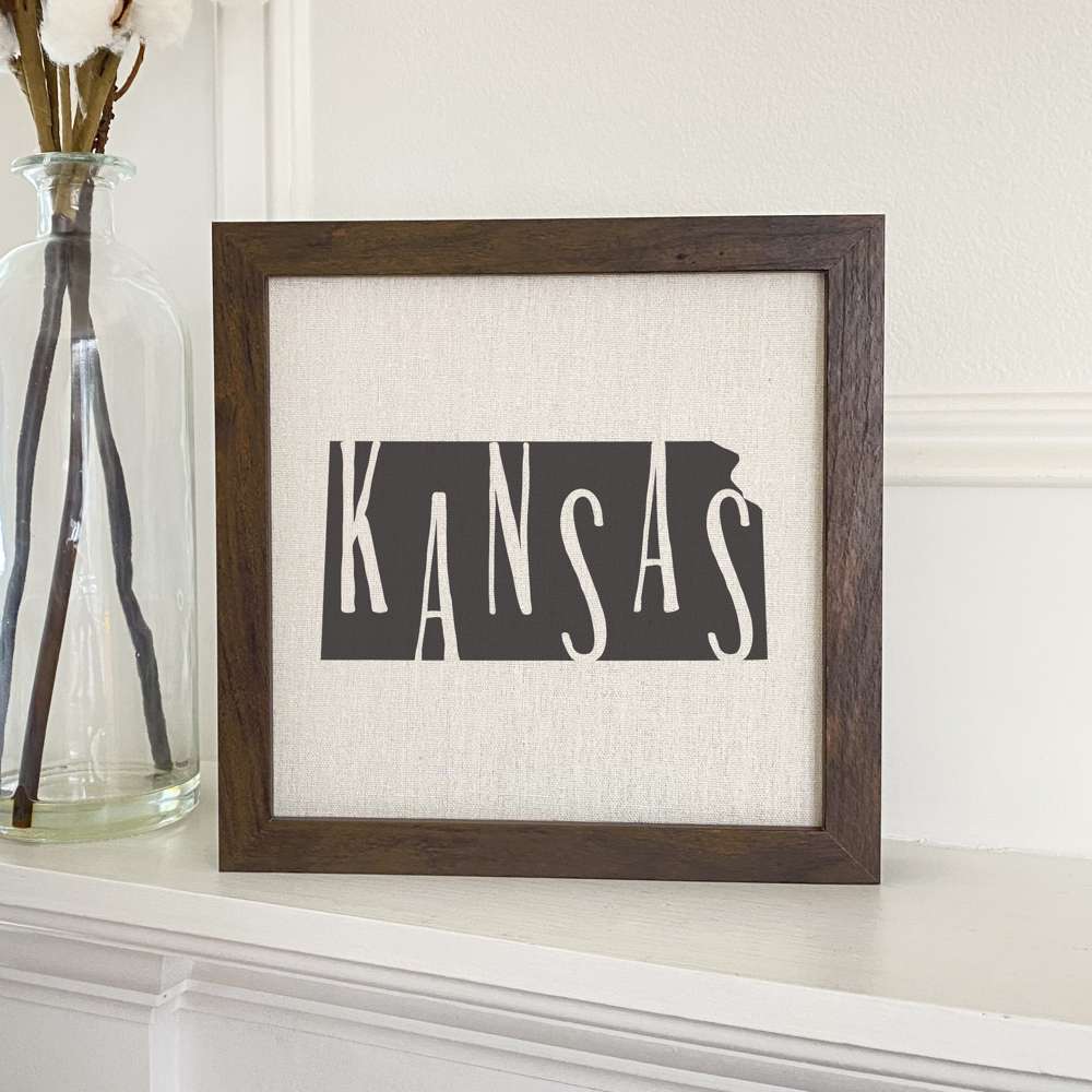 Stylish State Art Framed Sign with a wood frame, featuring eco-friendly printing on a linen-look background.