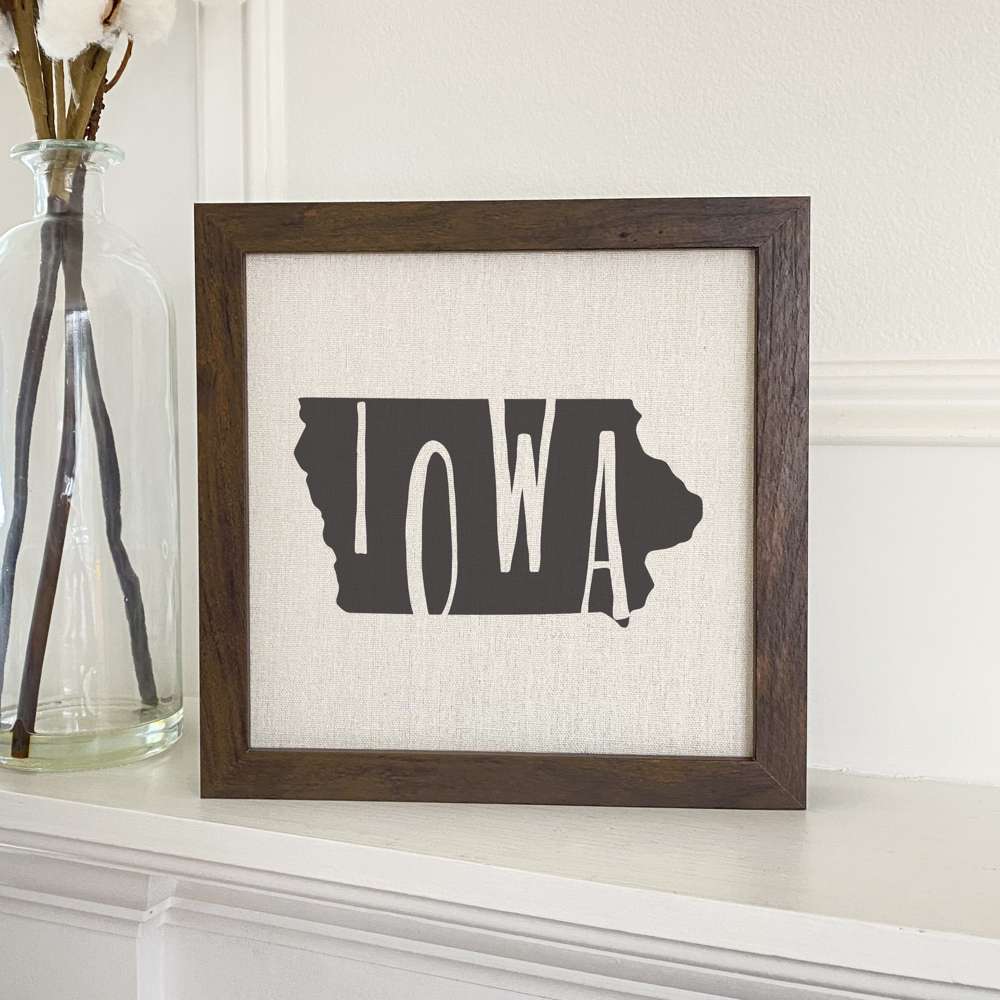 Stylish State Art Framed Sign with a wood frame, featuring eco-friendly printing on a linen-look background.