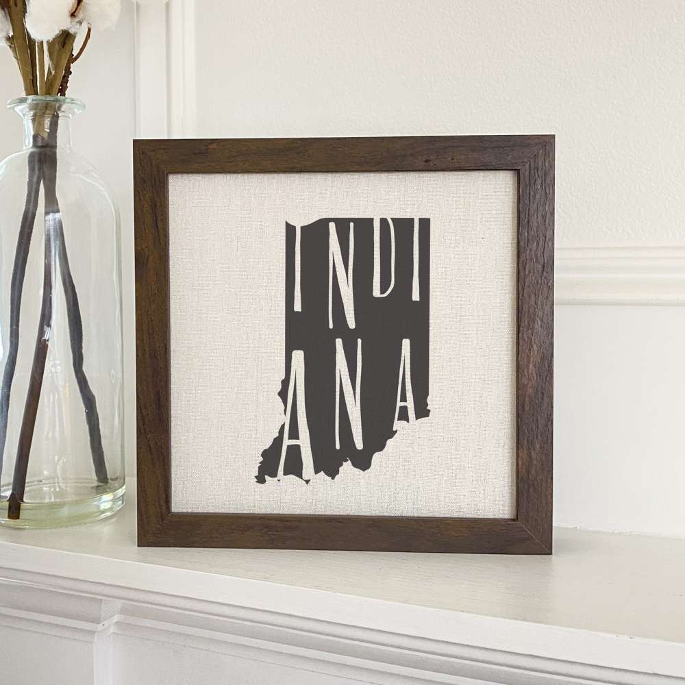 Stylish State Art Framed Sign with a wood frame, featuring eco-friendly printing on a linen-look background.