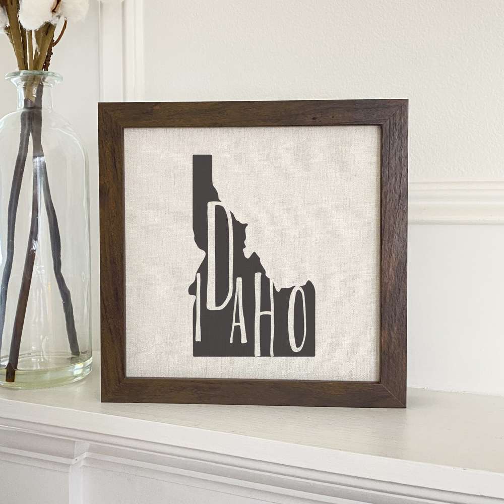 Stylish State Art Framed Sign with a wood frame, featuring eco-friendly printing on a linen-look background.