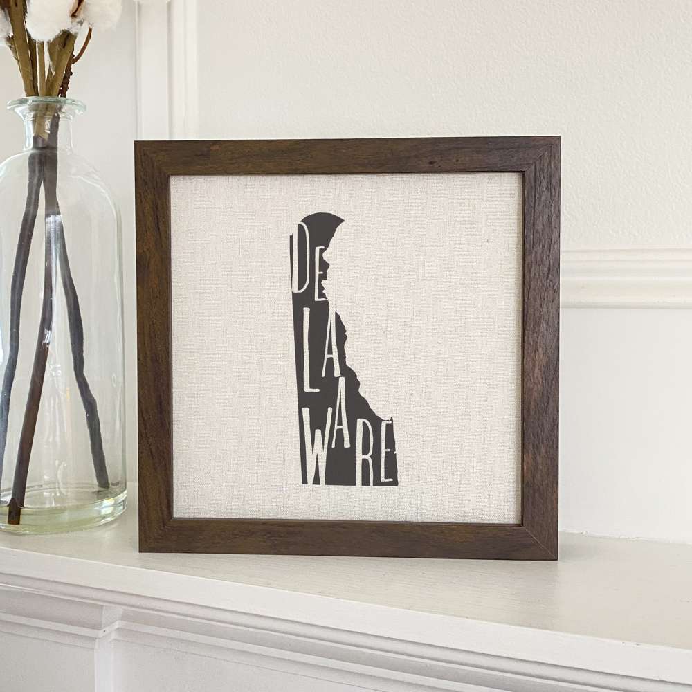 Stylish State Art Framed Sign with a wood frame, featuring eco-friendly printing on a linen-look background.