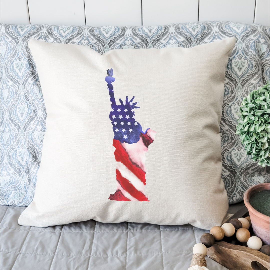 Statue of Liberty Pillow Cover featuring a vibrant design on soft linen fabric, with a hidden zipper and light beige background.