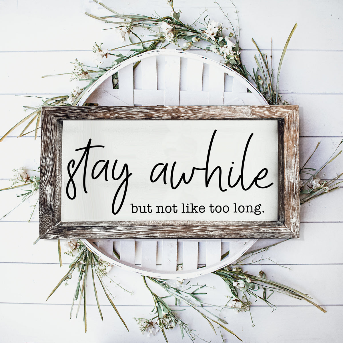 Stay Awhile Sign made of Paulownia wood featuring a humorous message, designed for wall hanging or standing display.