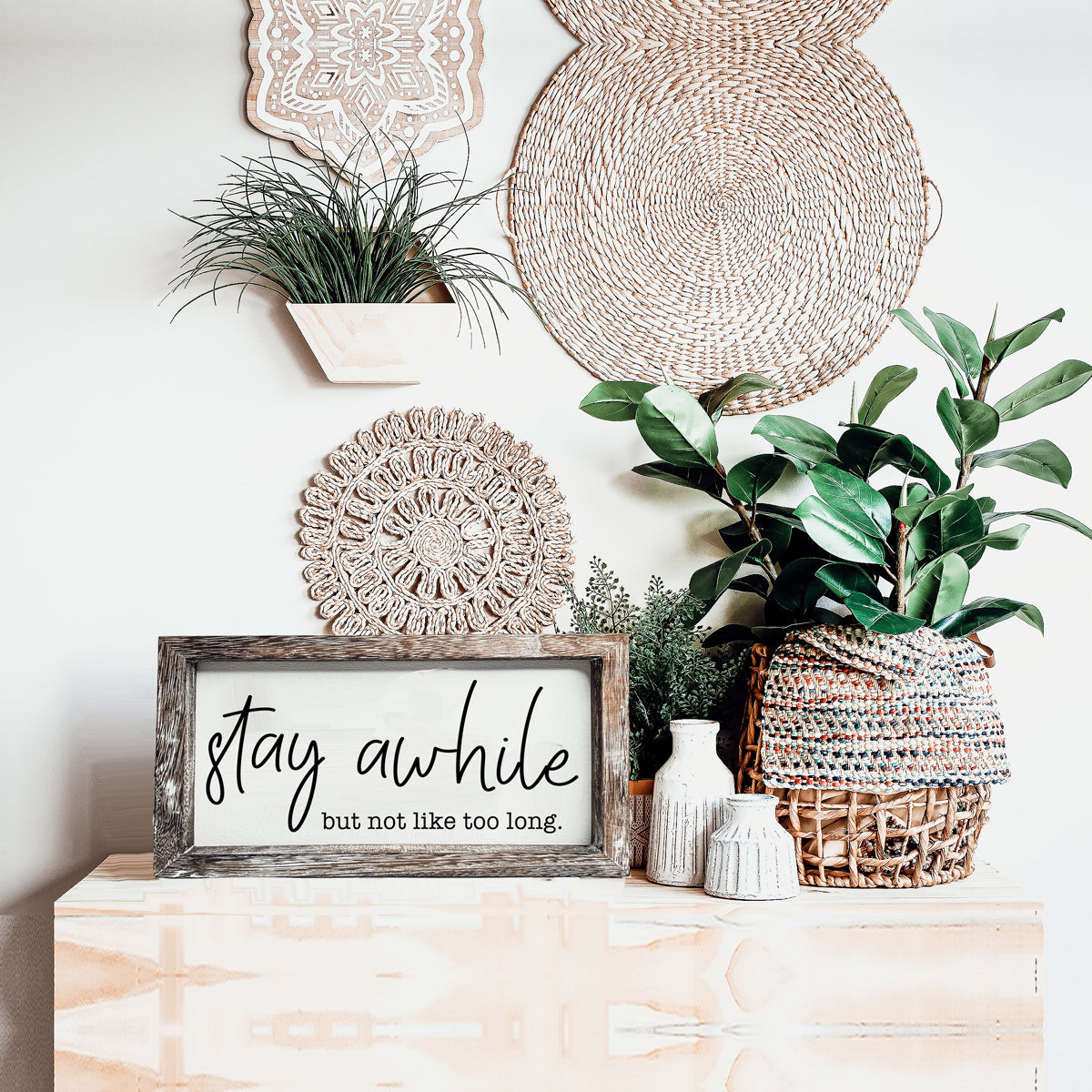 Stay Awhile Sign made of Paulownia wood featuring a humorous message, designed for wall hanging or standing display.