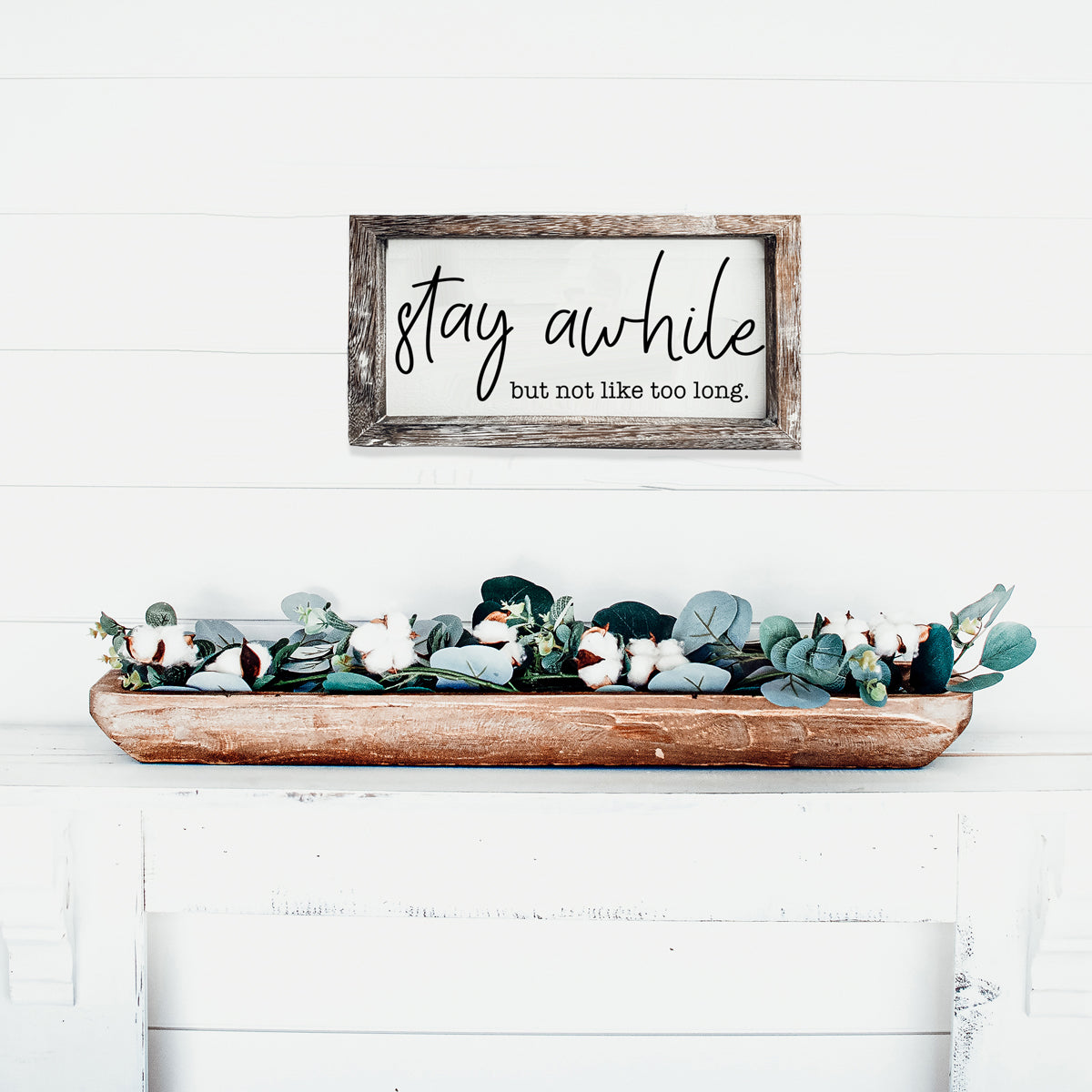 Stay Awhile Sign made of Paulownia wood featuring a humorous message, designed for wall hanging or standing display.