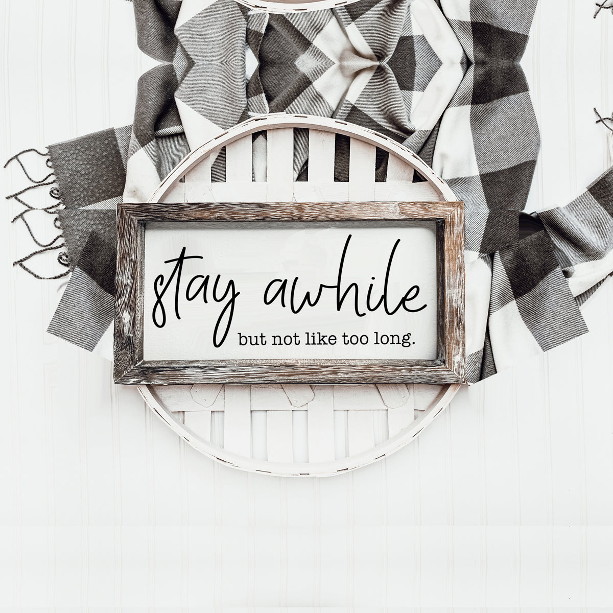 Stay Awhile Sign made of Paulownia wood featuring a humorous message, designed for wall hanging or standing display.