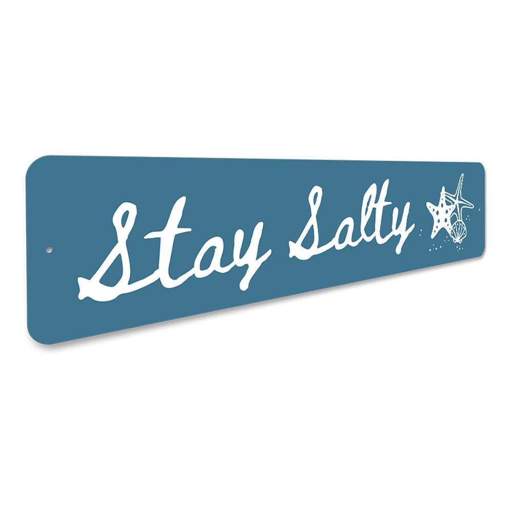 Stay Salty Beach Sign made of high-quality aluminum, featuring a coastal design perfect for beach houses and decor.