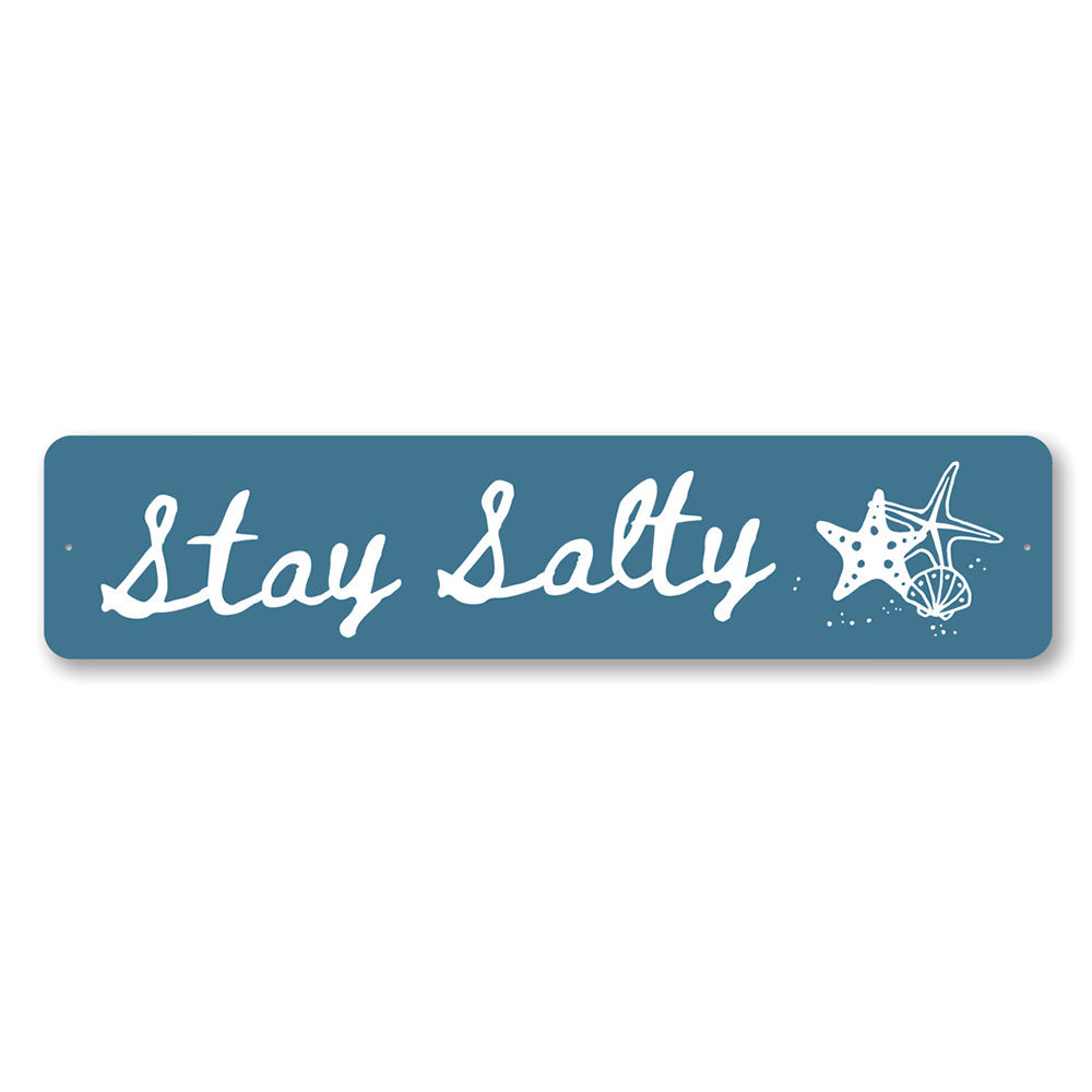 Stay Salty Beach Sign made of high-quality aluminum, featuring a coastal design perfect for beach houses and decor.