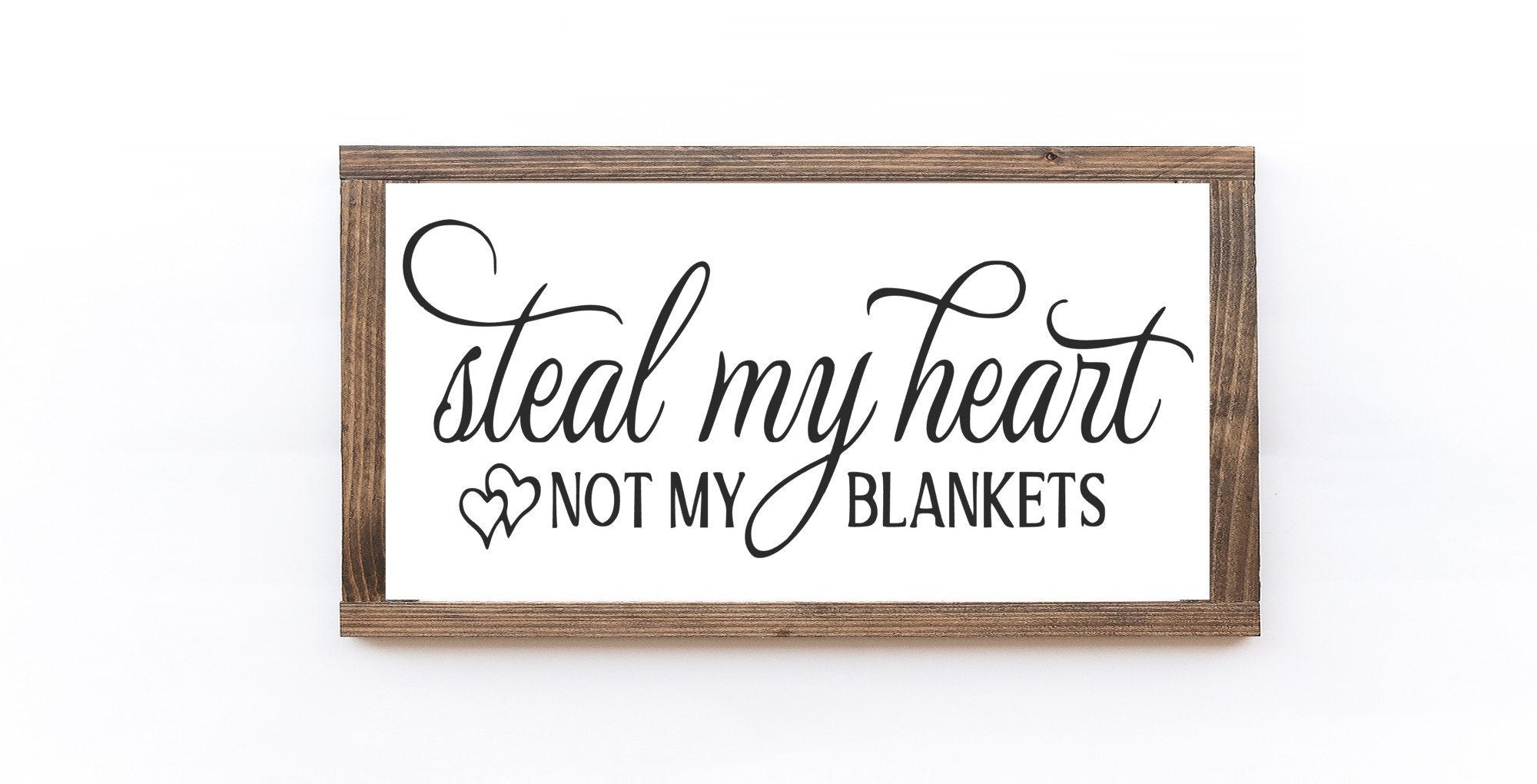 Steal My Heart Not My Blankets Wood Sign, handcrafted from wood with a matte white background and playful lettering.