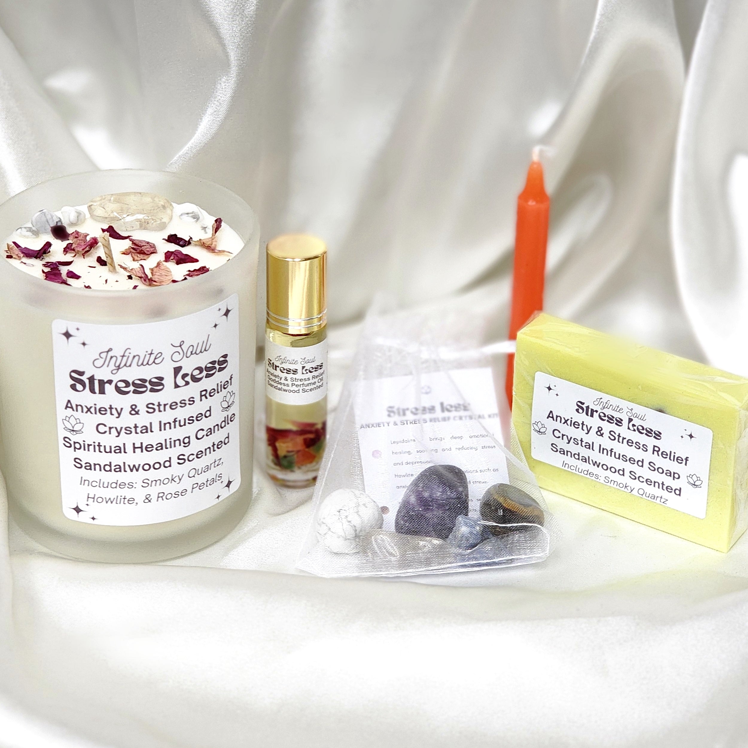 Stress Less Anxiety & Stress Relief Bundle featuring candles, crystals, body oil, and a notebook for relaxation and emotional healing.