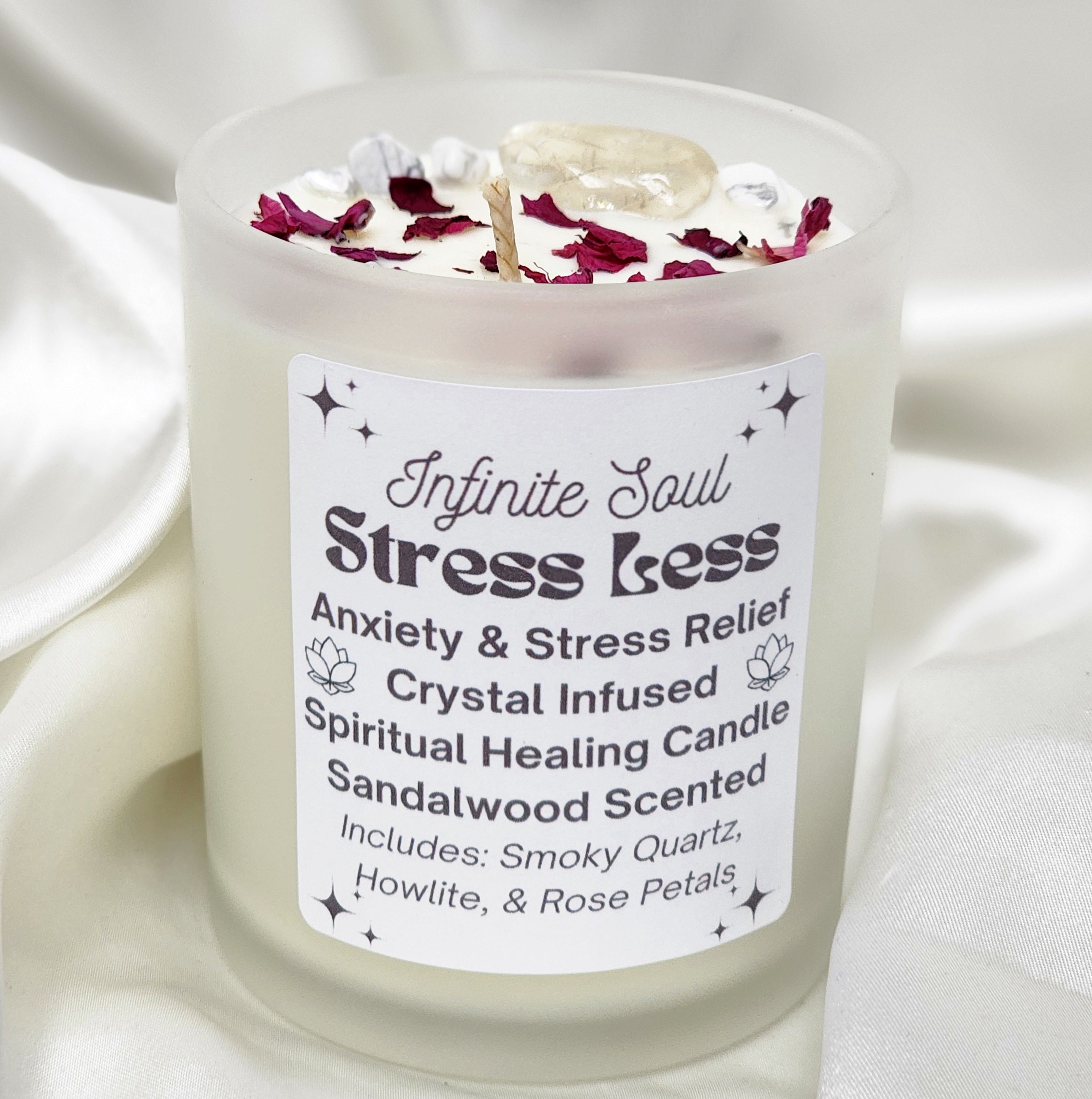 Stress Less Crystal Infused Candle with Smoky Quartz and Howlite, featuring a Sandalwood scent and rose petals in a clear glass container.