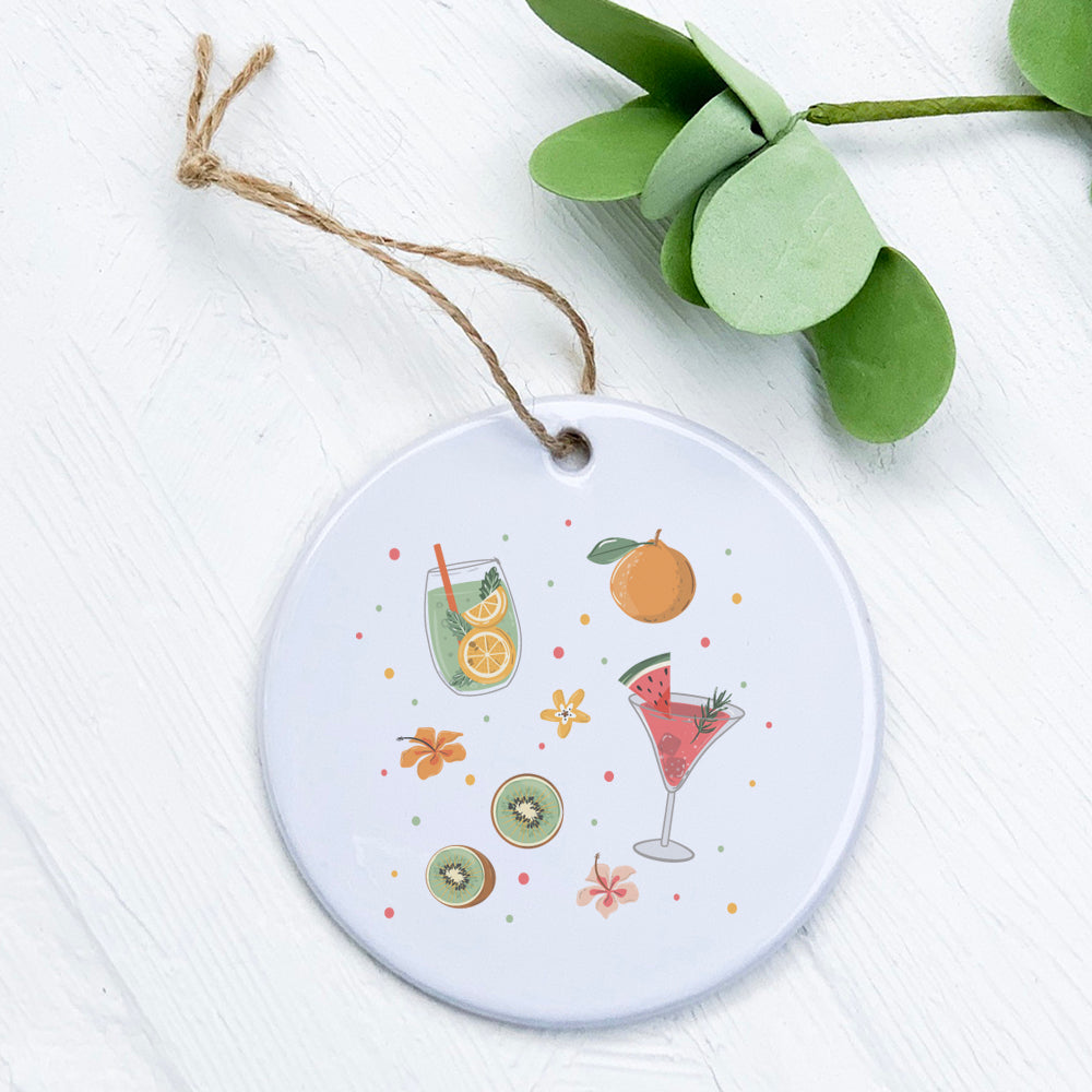 A beautifully designed porcelain ornament featuring summer drinks, perfect for gifting or as a wine bottle tag.