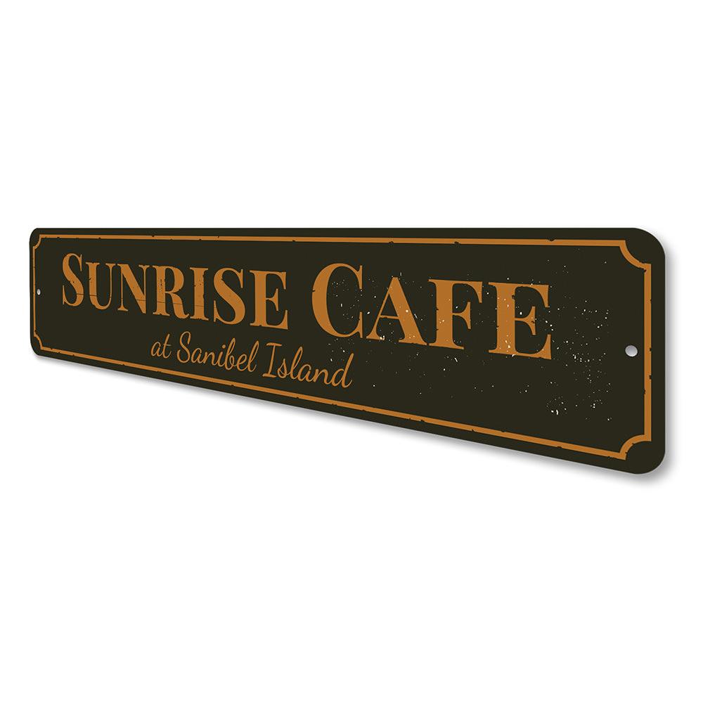 A beautifully crafted Sunrise Cafe Sign made of aluminum, featuring vibrant colors and customizable text, perfect for beach-themed decor.