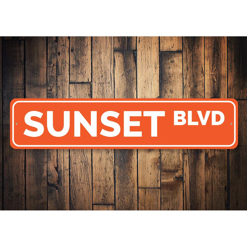 A vibrant Sunset Blvd Sign made of high-quality aluminum, featuring beach-themed design elements, perfect for coastal decor.