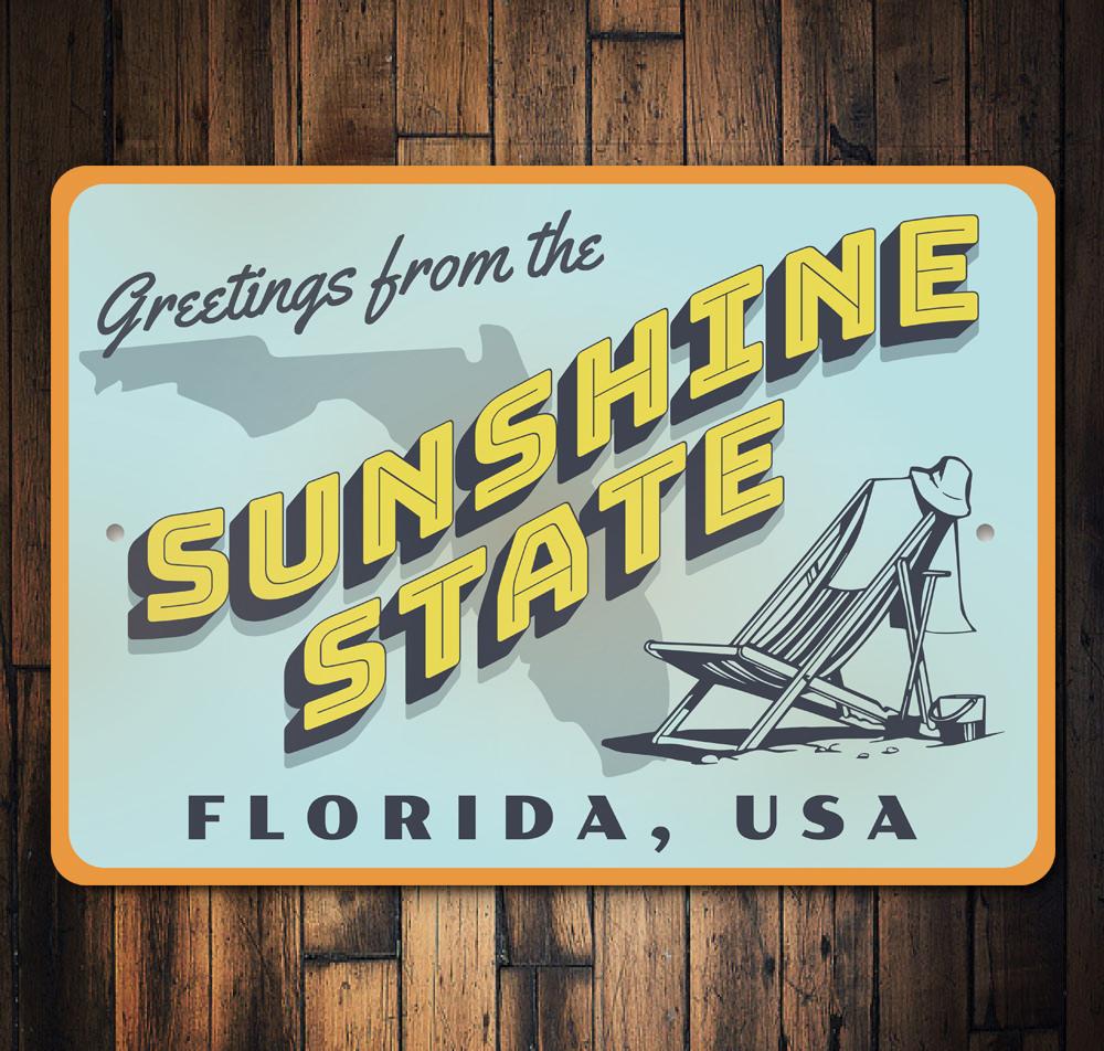 Sunshine State Greetings Sign made of high-quality aluminum, featuring vibrant colors and customizable text, perfect for beach-themed decor.