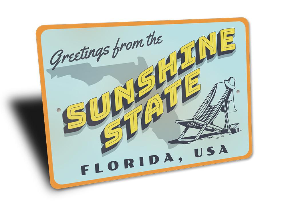 Sunshine State Greetings Sign made of high-quality aluminum, featuring vibrant colors and customizable text, perfect for beach-themed decor.