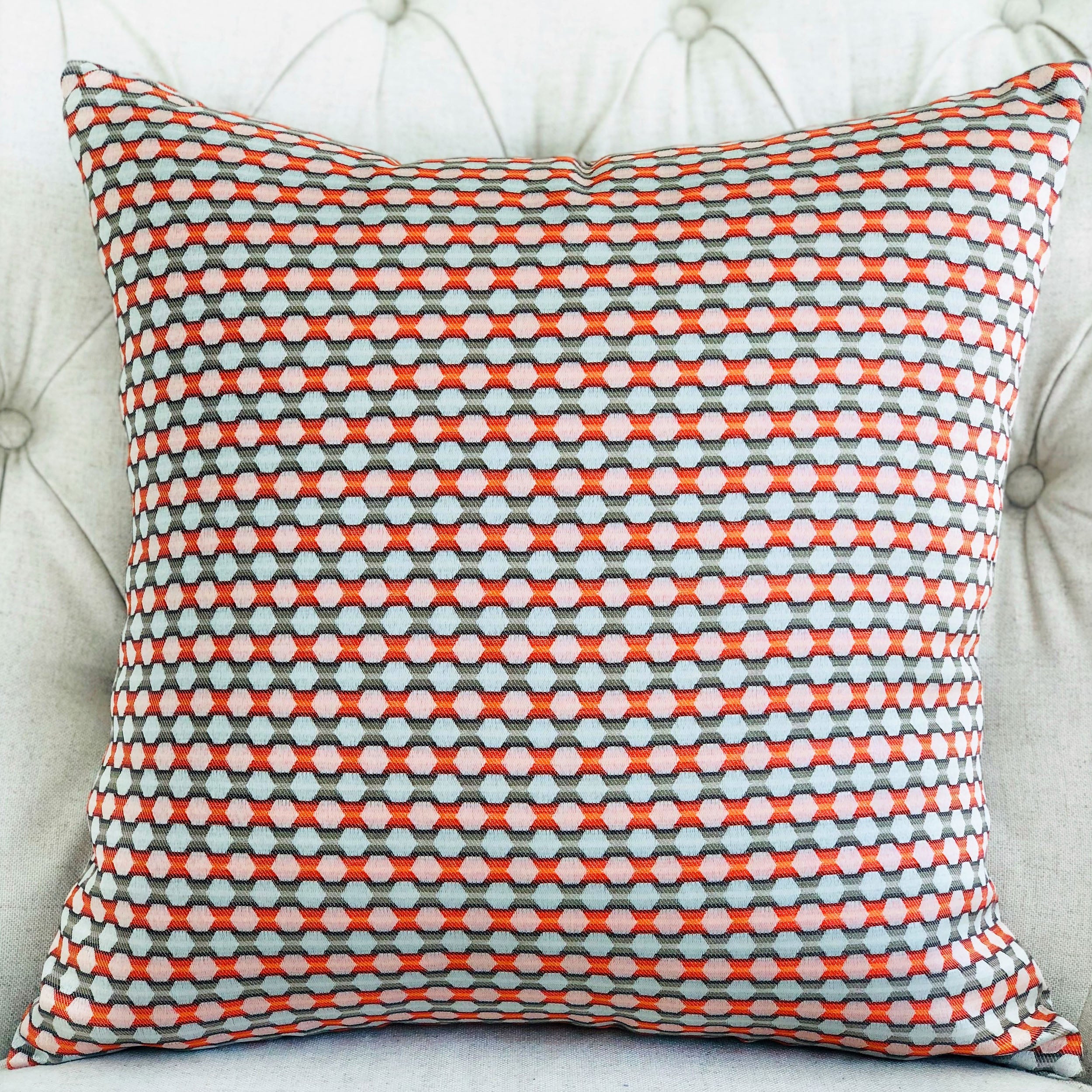 Sunny Cave Orange and Beige Luxury Throw Pillow with geometric pattern, showcasing its elegant design and high-quality fabric.