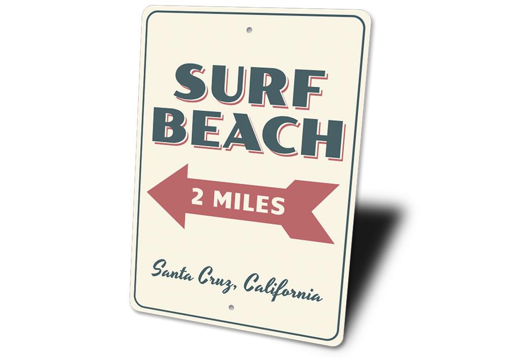 A vibrant Surf Beach Sign made of aluminum, featuring beach-themed graphics, perfect for coastal decor.