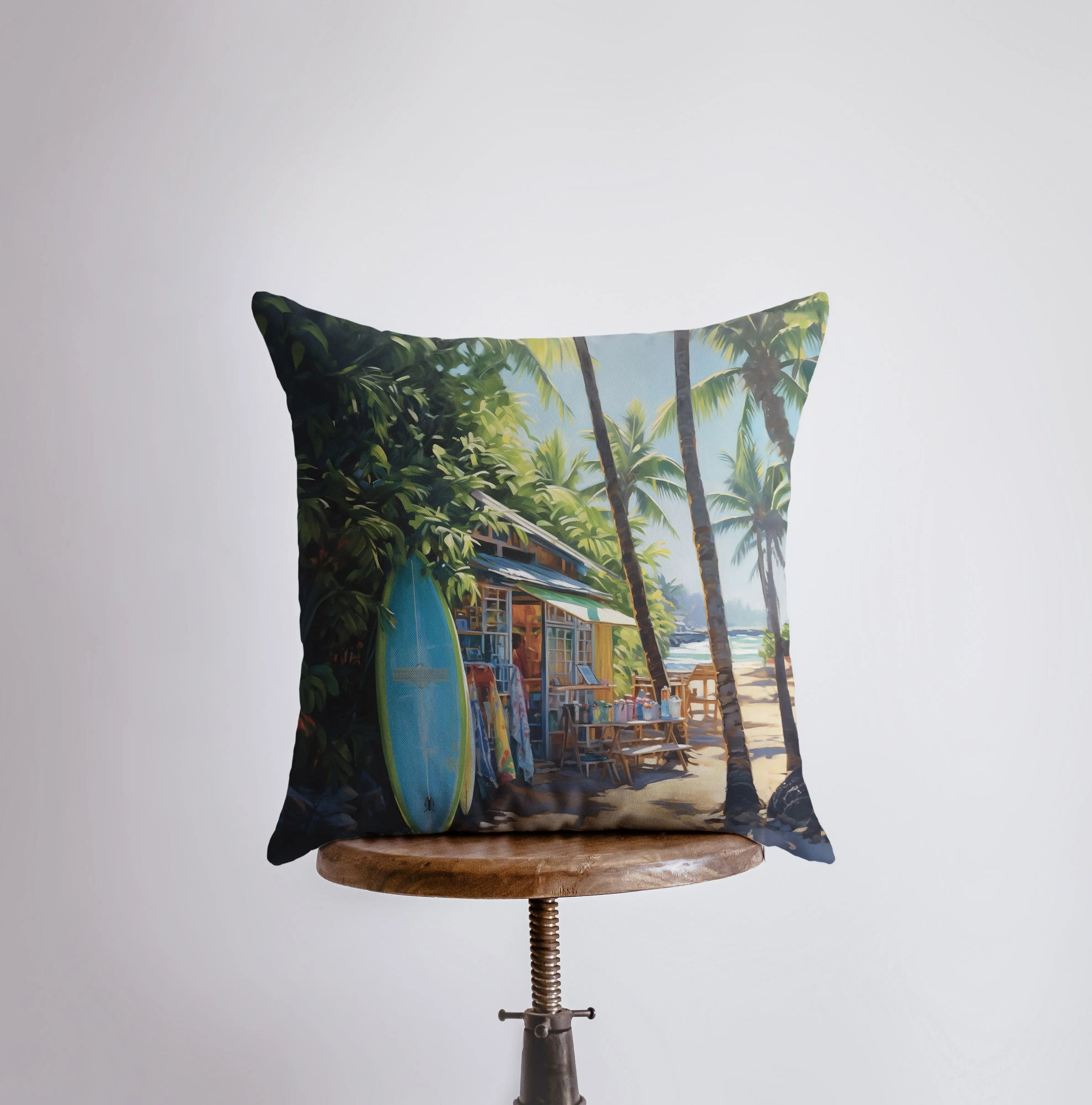 Surf Hut throw pillow featuring a vibrant gouache painting of a surfboard and palm tree, perfect for coastal decor.