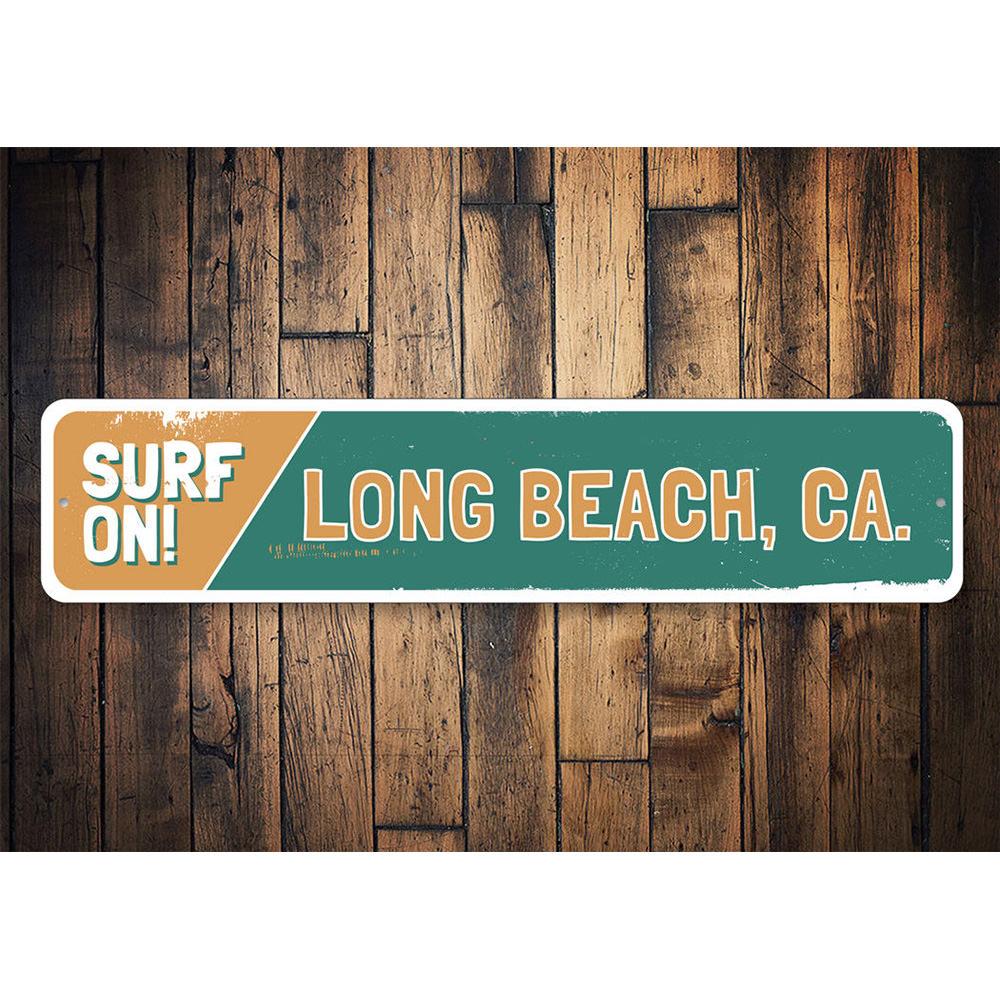 A vibrant Surf On Sign made of aluminum, featuring beach-themed graphics, perfect for coastal decor.