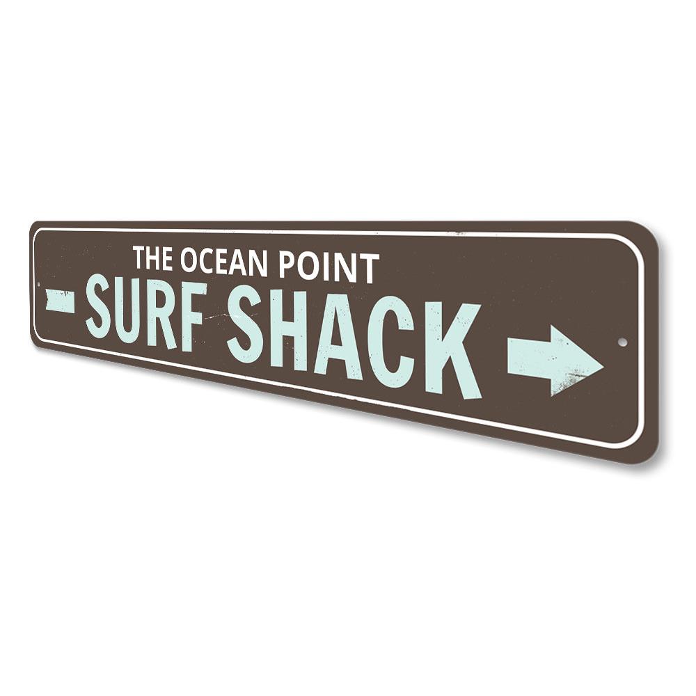 Surf Shack Arrow Sign made of high-quality aluminum, featuring a beach-themed design perfect for coastal decor.