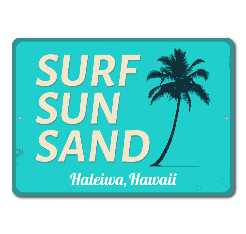 A decorative Surf Sun Sand Sign made of aluminum, featuring vibrant colors and a beach-themed design, perfect for coastal decor.