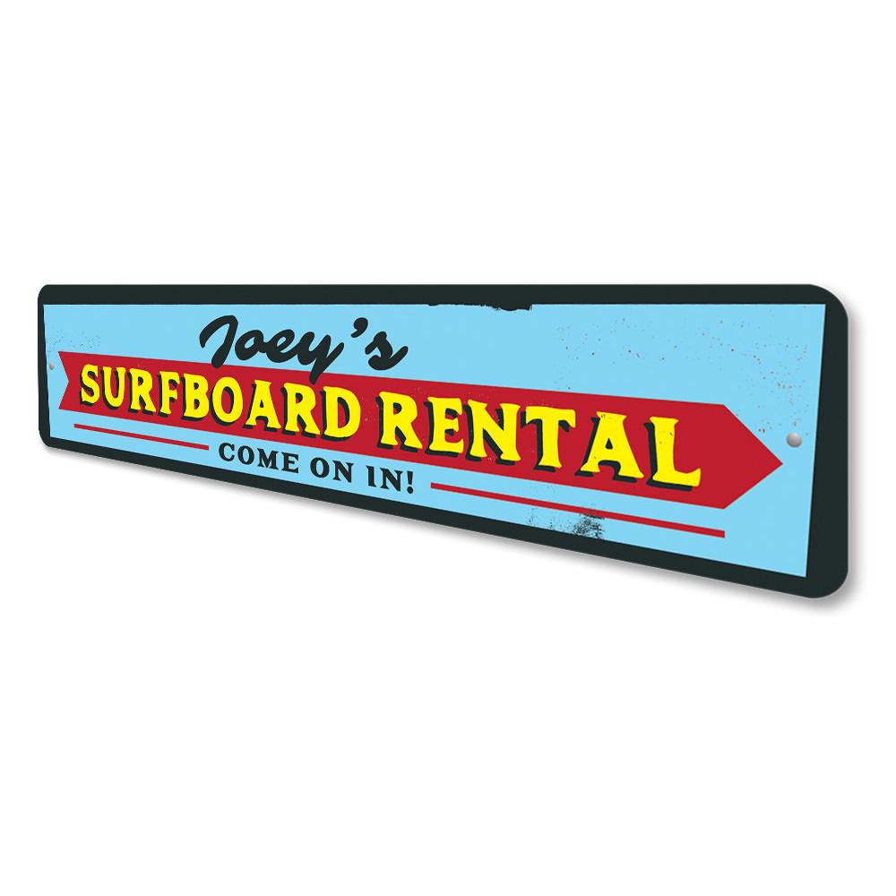 A vibrant Surfboard Rental Sign made of high-quality aluminum, featuring customizable text and a beach-themed design, perfect for coastal decor.