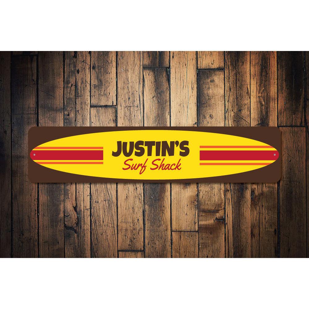 A vibrant Surfboard Sign featuring customizable text, made from high-quality aluminum, perfect for beach-themed decor.