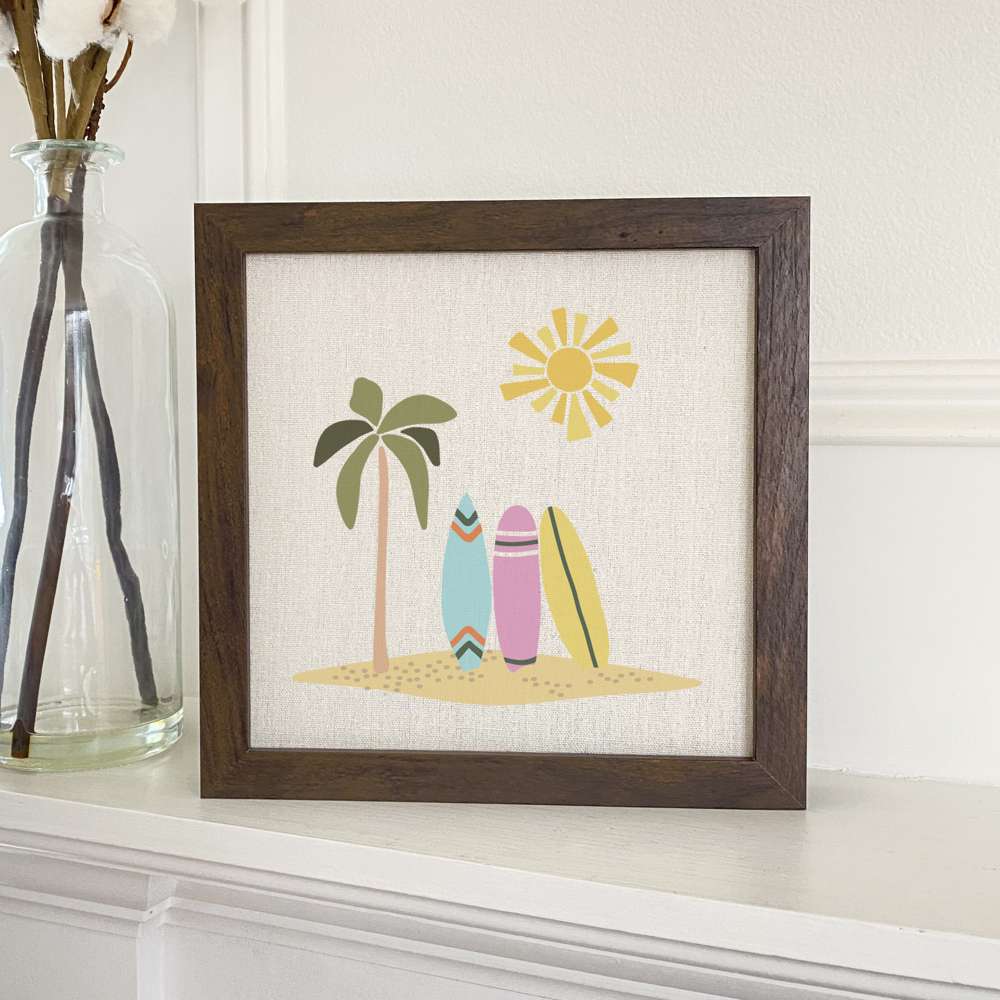 Stylish Surfboards Framed Sign with a wood frame and linen-look background, perfect for home decor.