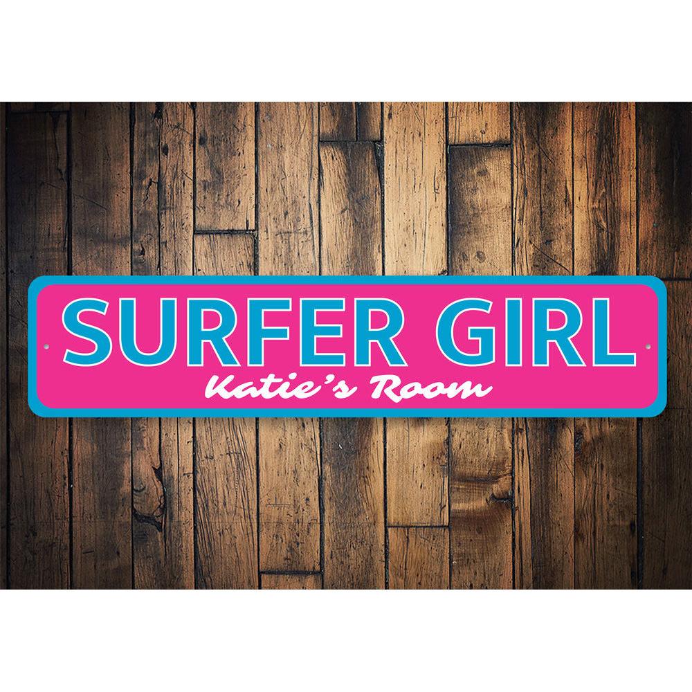 A colorful Surfer Girl Sign featuring a vibrant beach theme, perfect for kids' rooms and beach decor.