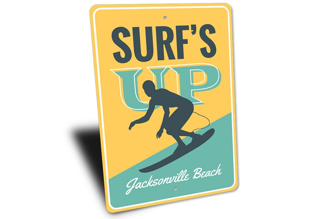 Surf's Up Sign made of durable aluminum, featuring beach-themed design, perfect for coastal decor.