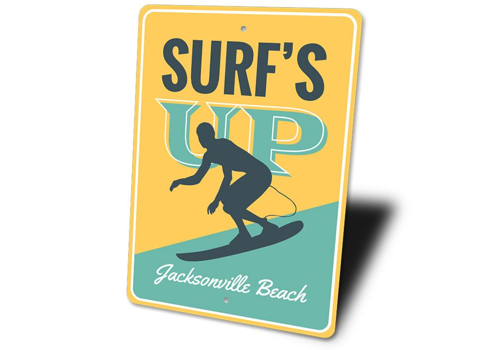 Surf's Up Sign made of durable aluminum, featuring beach-themed design, perfect for coastal decor.