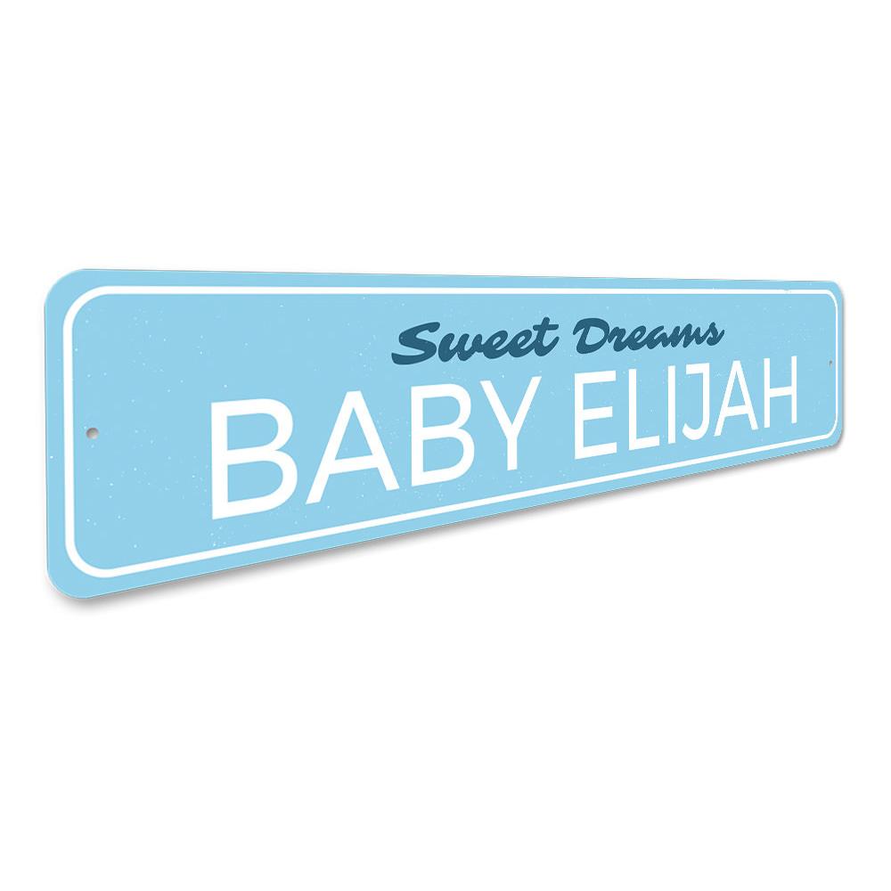 A personalized Sweet Dreams Baby Name Sign made of high-quality aluminum, featuring a child's name in a playful font, perfect for nursery decor.